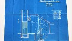 Dessin technique hydraulique sur papier bleu avec détails de l'installation et mesures