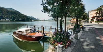 A wooden boat on the Lugano lake 