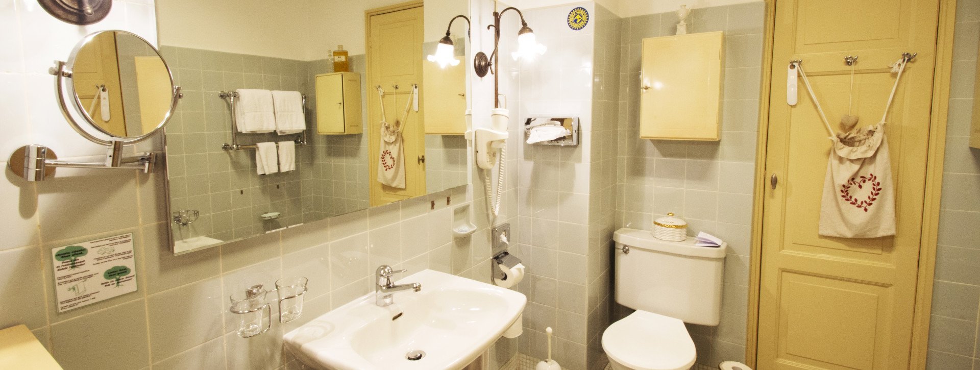 Bathroom with a yellow door 